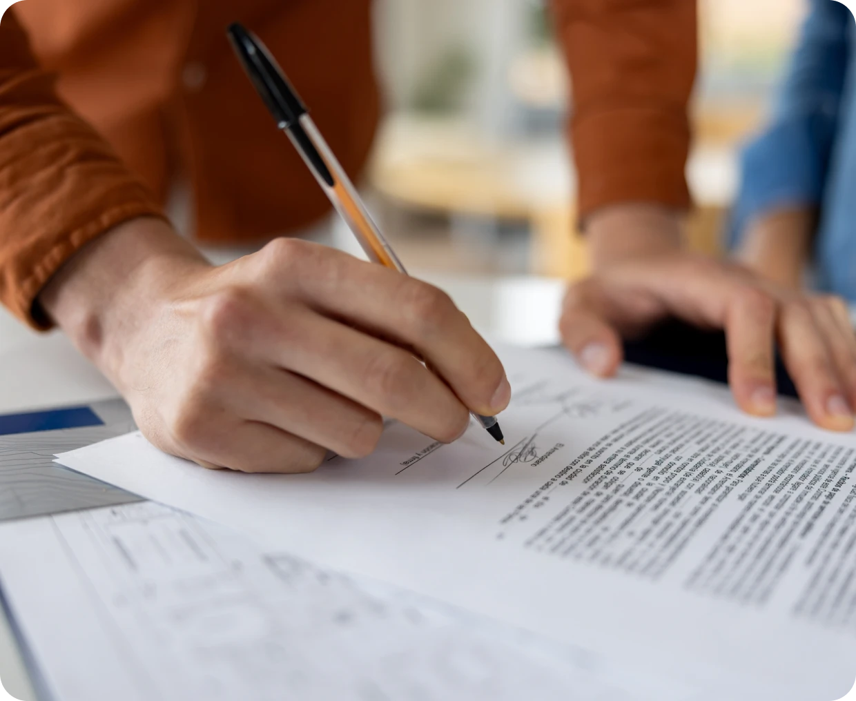 Signing a document with a pen